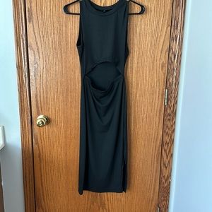Women’s black dress with mid-drift cut out